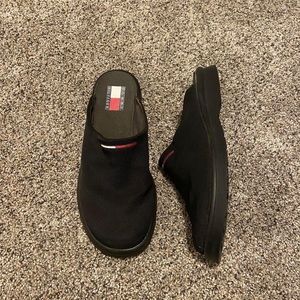 90’s Black tommy hilfiger loafer slip on mules. a hard bump inside of one sole.
